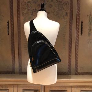 ( Sold) 100% authentic black Gucci backpack sling